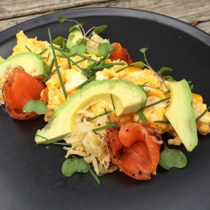 Smoked salmon with scrambled eggs, avocado & fresh herbs