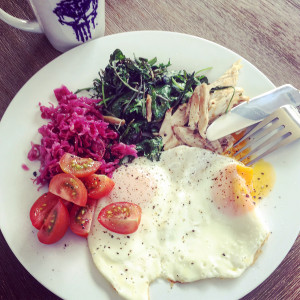 Leftover chicken, sauerkraut, fried eggs, kale & cherry toms